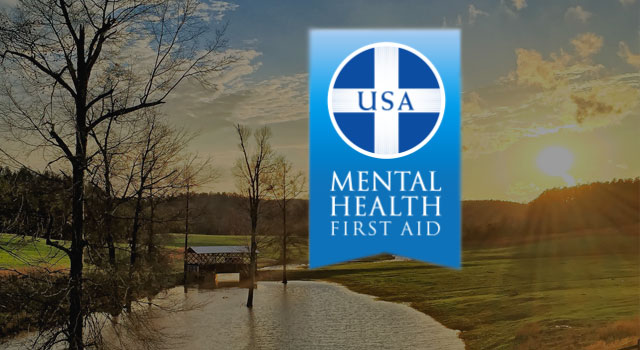 Image of USA Mental Health First Aid Logo with Farm, Lake and Sun Background